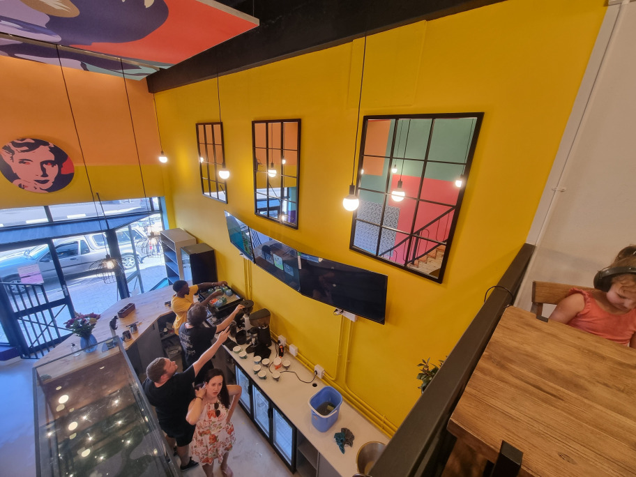 Bakery overview staircase patterned wall and ceiling artwork