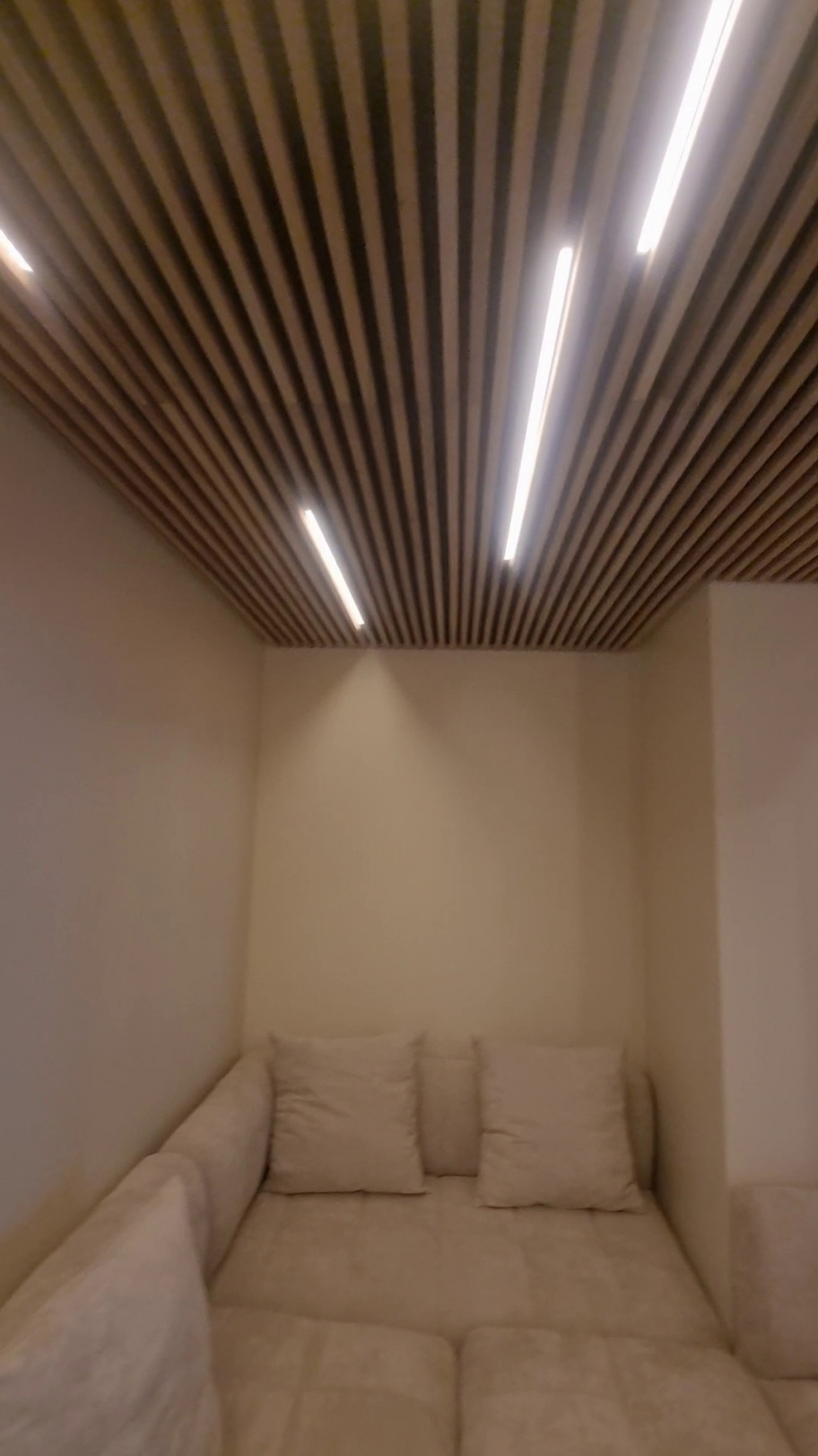 Penthouse slatted TV wall with LED lighting